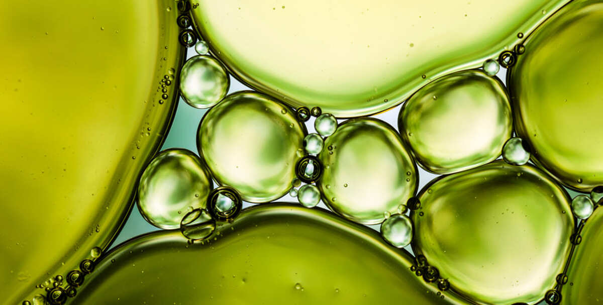 Soft water bubbles filling the background of the comparison table